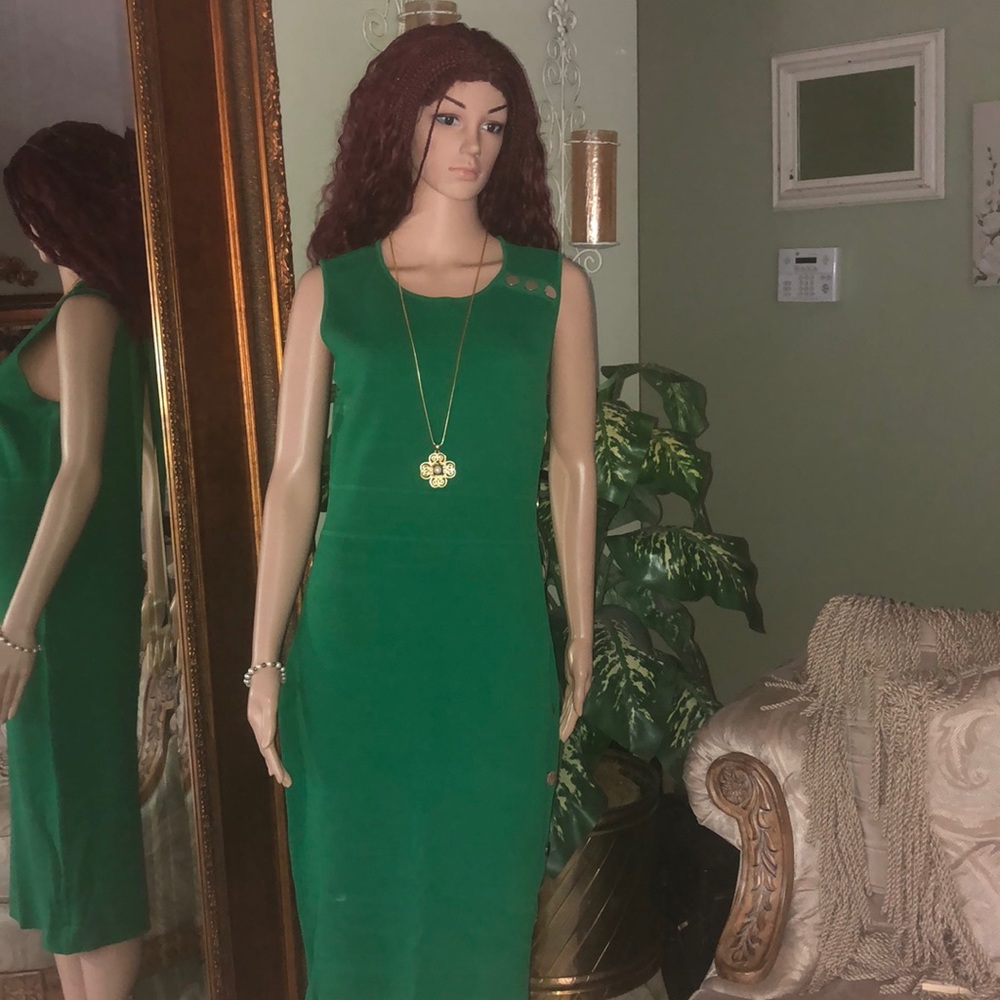Green dress with gold buttons along the side.